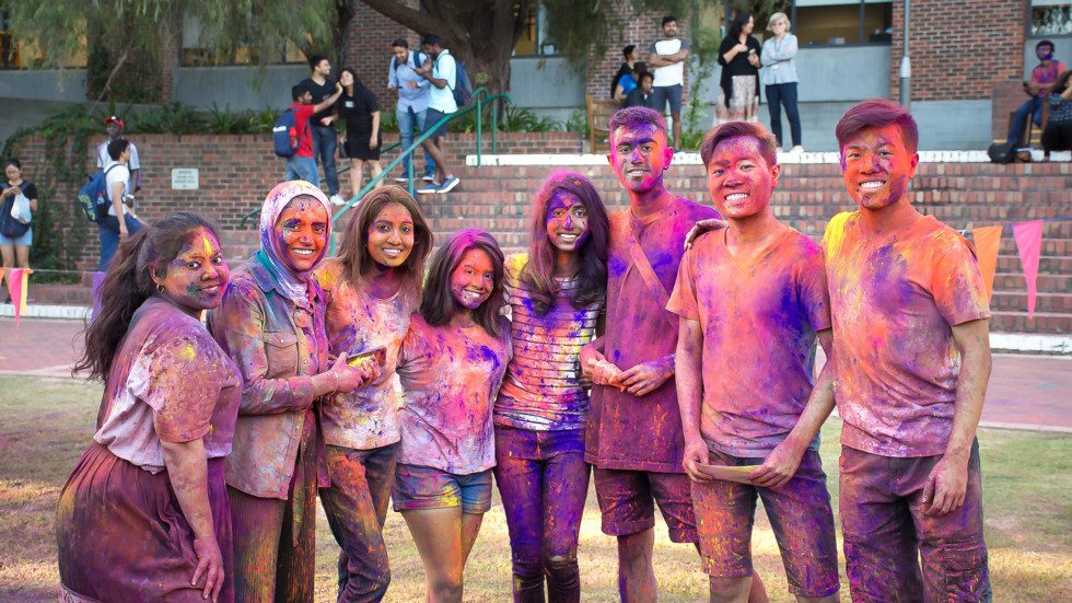 Students at Holi festival.