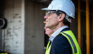 Curtin staff member inspecting a construction site.