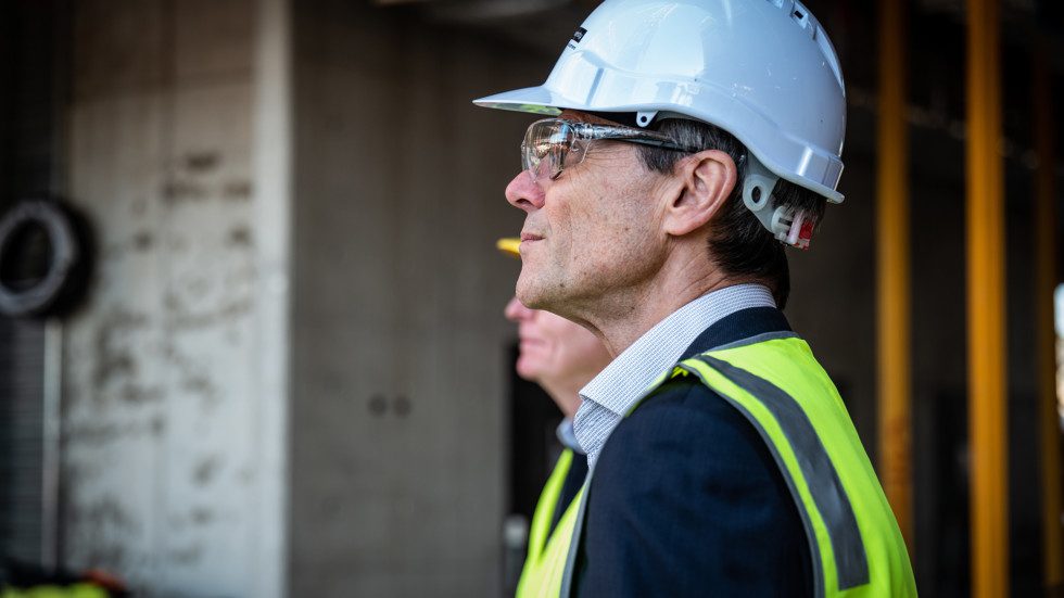 Curtin staff member inspecting a construction site.