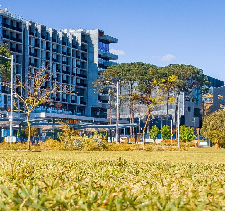 A ground level photo of Exchange including UnliLodge, School of Design and Built Enviornment and Nesuto Hotel